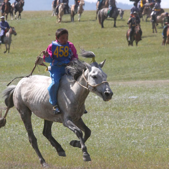 A boy attending horse race in Hatgal town, Hovsgol province